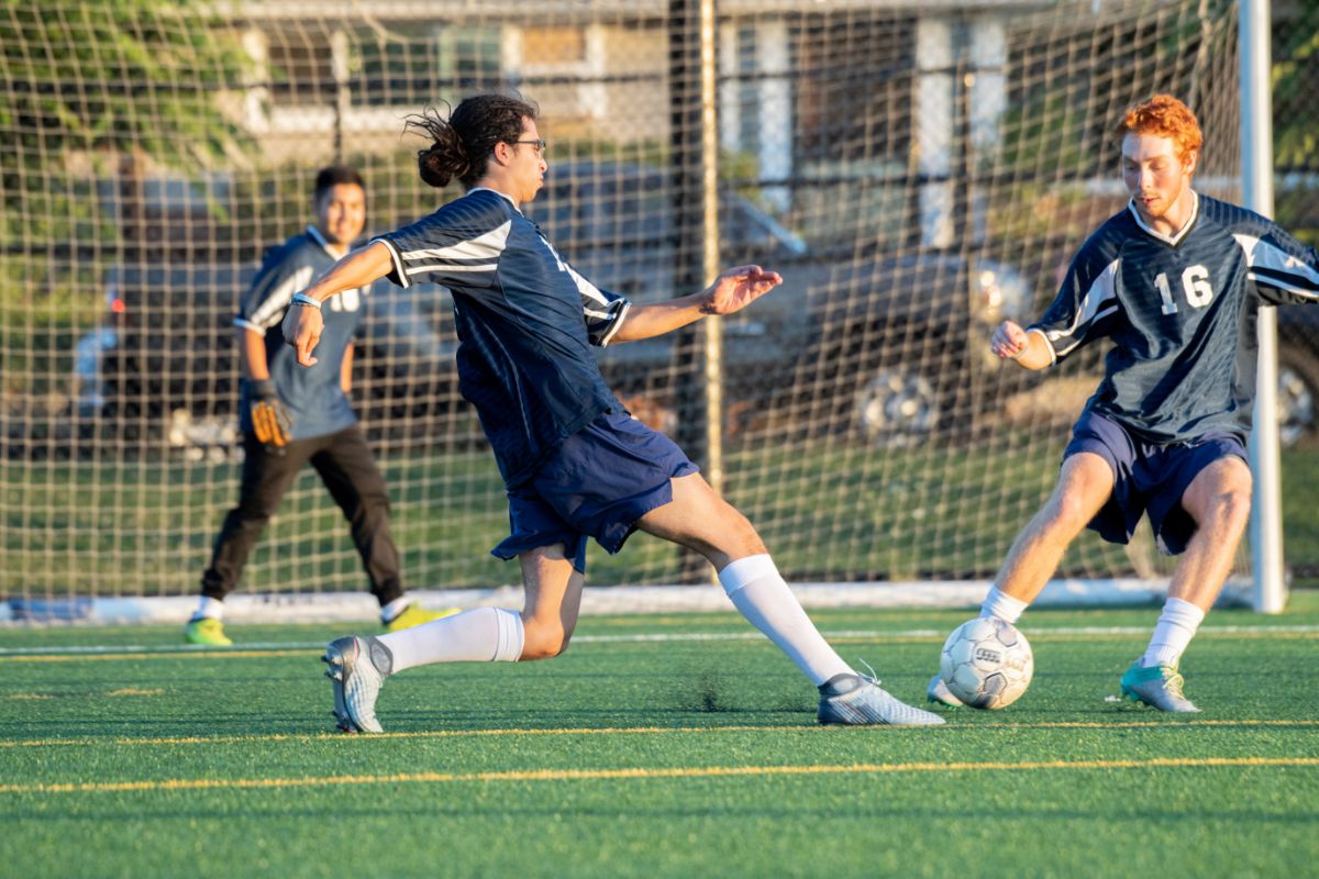 How Long Is A Soccer Game? - players fighting for the ball